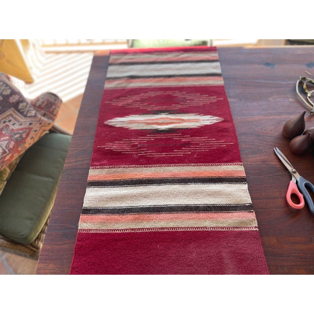 Vintage New Mexican wool Chimayo tapete Burgundy Red weaving. This one is extremely unique and actually quite different...