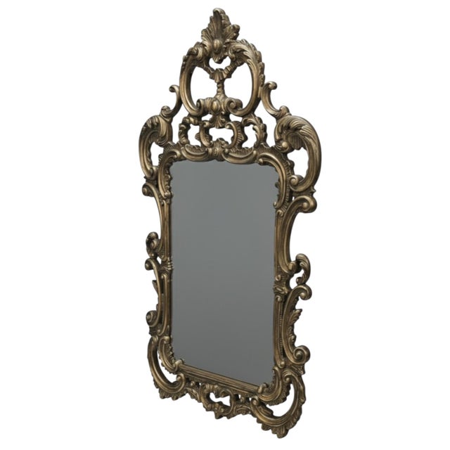Featuring an intricately carved openwork frame, this piece captures the essence of 18th-century French design with its...