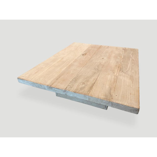 Beautiful bleached reclaimed teak wood coffee table with a fine white wash finish. We added butterfly inlays into the wood...