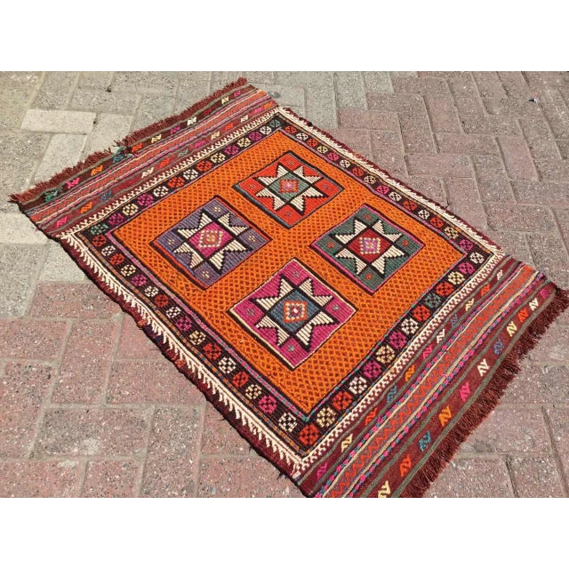 This beautiful, vintage, handwoven kilim is approximately 60 years old. It is handmade, of very fine quality hand spun...