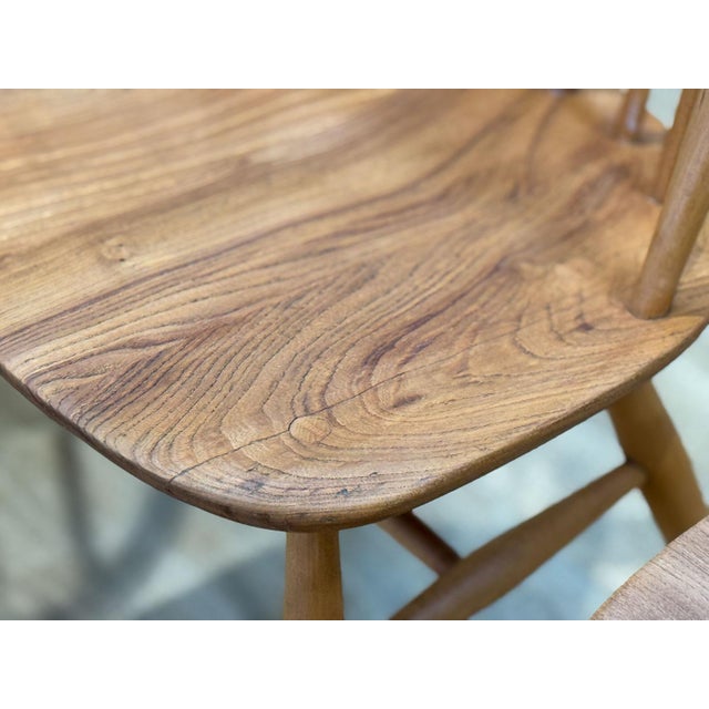 A masterpiece of mid-century craftsmanship, this exquisite folding table and four Quaker chairs were designed by Lucian...