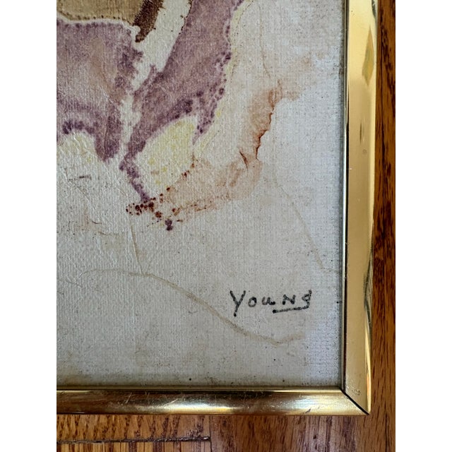 A fascinating original abstract collage by Zura Young, signed at the lower right and presented in a slim gold metal frames...