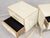An ivory Murano glass exterior gives this two-drawer bedside pair a calm, sculptural look. Polished brass outlines the...