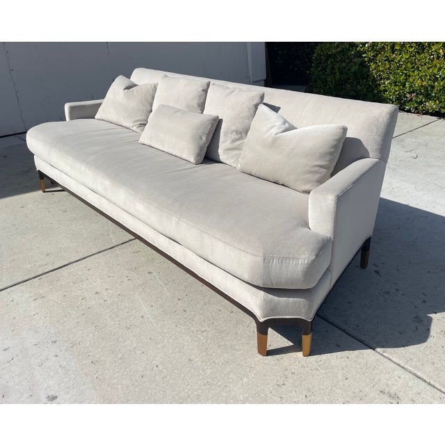 Elegant 100” Baker Celestite sofa upholstered in light gray/silver performance velvet. Designed by Jean Louis Denoit from...