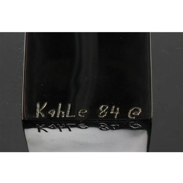 Gary Kahle (American, 1942- ) Metal abstract sculpture on black base, Hand signed and dated 1984 25 1/2" H x approximately...