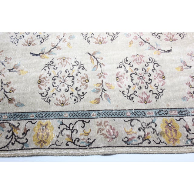 Textile Vintage Turkish Floral Carpet – Hand-Knotted Elegance in Soft Pastels -6' 7'' X 10' For Sale - Image 7 of 13