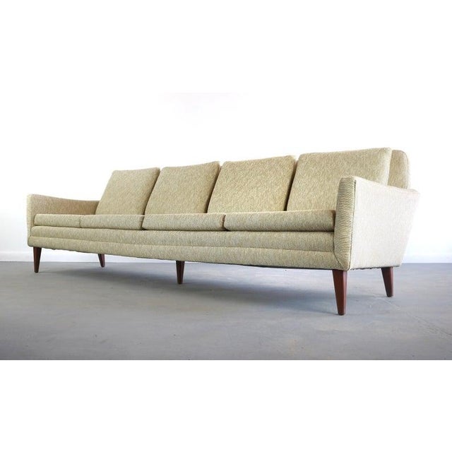 Folke Ohlsson for DUX Mid-Century Sofa in Original Fabric The answer is Yes, this complimentary piece does belong in your...