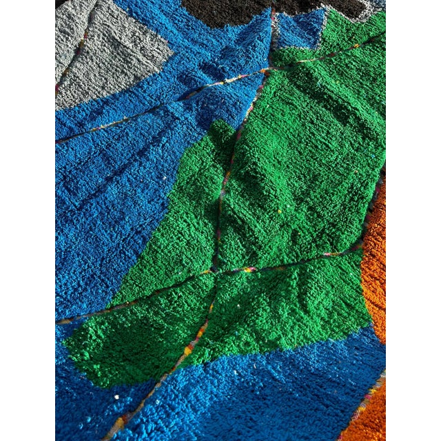 Discover the vibrant beauty of a Colorful Moroccan Berber Rug. This Authentic Handwoven Wool Carpet is a stunning piece...