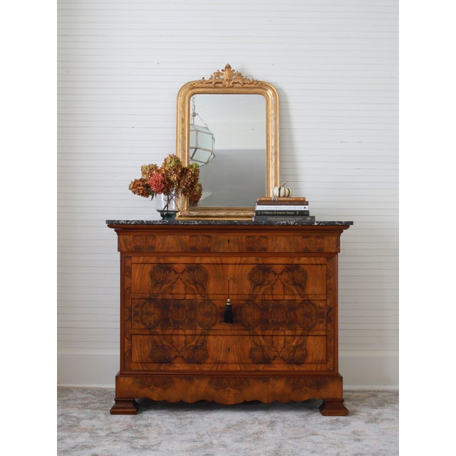 This charming Louis-Philippe commode, crafted in France in the early to mid-19th century (circa 1830–1860), exemplifies...