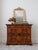 This charming Louis-Philippe commode, crafted in France in the early to mid-19th century (circa 1830–1860), exemplifies...