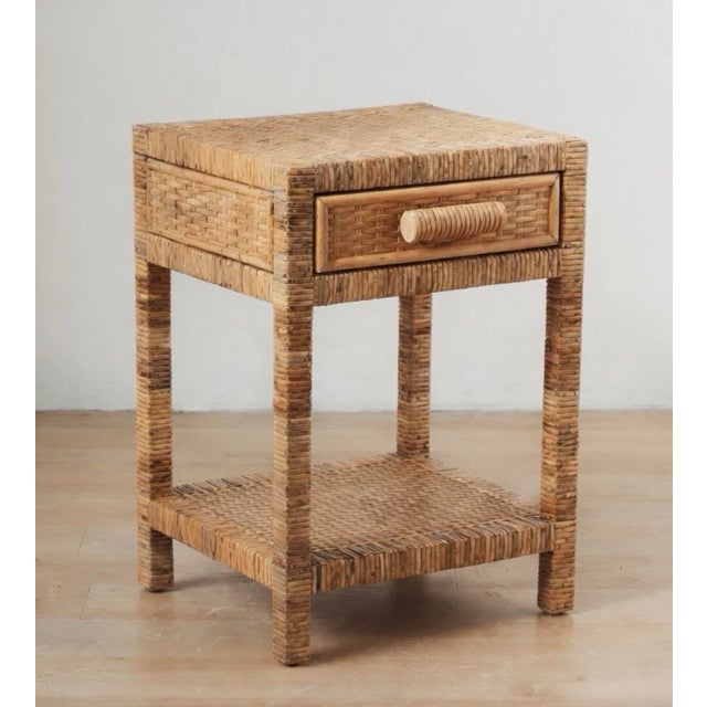 Woven wicker bedroom set includes one large six-drawer dresser and two matching nightstands. Material is natural rattan in...