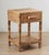 Woven wicker bedroom set includes one large six-drawer dresser and two matching nightstands. Material is natural rattan in...