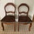 Grandmillenial style with a contemporary twist! Antique Handcarved Side Chairs With Leaf Design and Leopard Upholstery and...