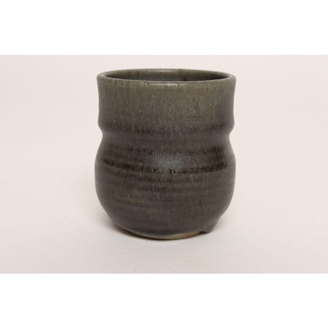 Glazed stoneware bud vase by ceramicist, Deanna Nichols (b. 1942-2017, Missouri). Holding a BFA from Kansas City Art...