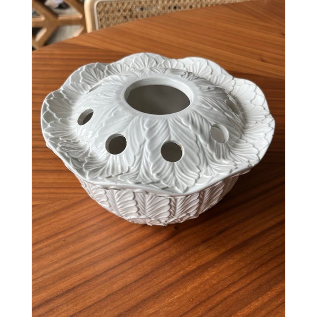 A lovely Italian piece with a stunning texture made up of overlapping leaves will add to the beauty of any bouquet.