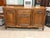 Design Plus Gallery presents an Antique French Louis XV Style Sideboard. Showcasing classic European form with ornate...