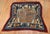 An early 20th century Tibetan dragon horse cover textile rug, circa 1900, measures: 2'5" x 4'.