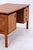 Vintage teak desk by Arne Vodder featuring the typical organic details of Danish Modern design. The delicate handle...