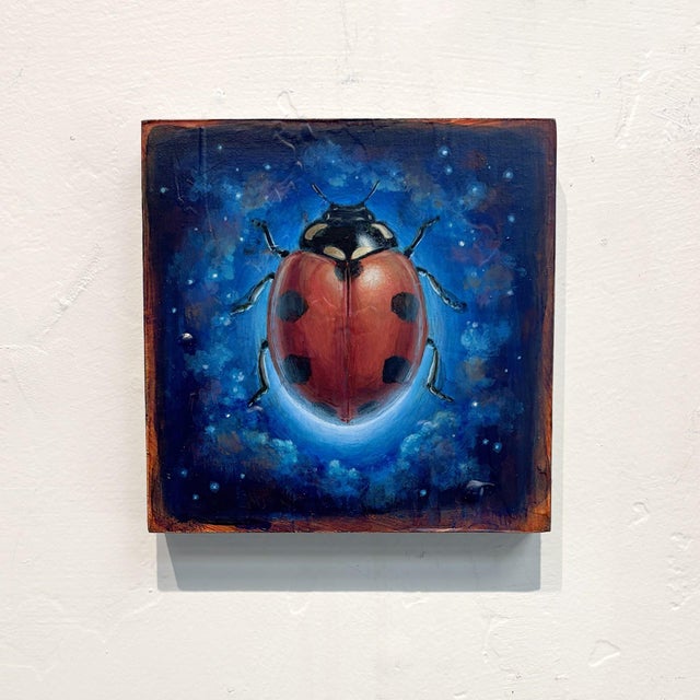 Space Beetle 01 features a vividly rendered ladybug, its striking red shell adorned with black spots, set against a cosmic...