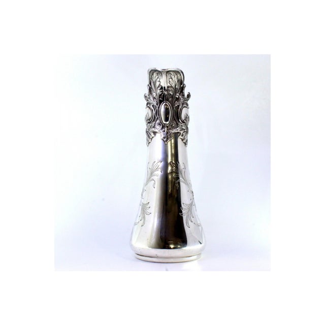 Art Nouveau Silver Water Jug with Floral Motifs and Acanthus Leaf-Shaped Handle Lid, in Very Good conditions. Designed...