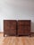 A substantial pair of rustic three-drawer bedside chests by Circa Loft, featuring beautifully textured wood, a warm,...