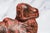 Add a touch of rustic character to your space with this hand-carved wooden figure, finished in layers of aged red and...