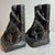 Antique Pompeian bronze clad bookends of a man entitled ‘The Builder’. Great condition.