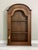 Italian country style hanging wood cabinet with a chicken wire door and key with lock, Italy, mid to late 20th century. A...