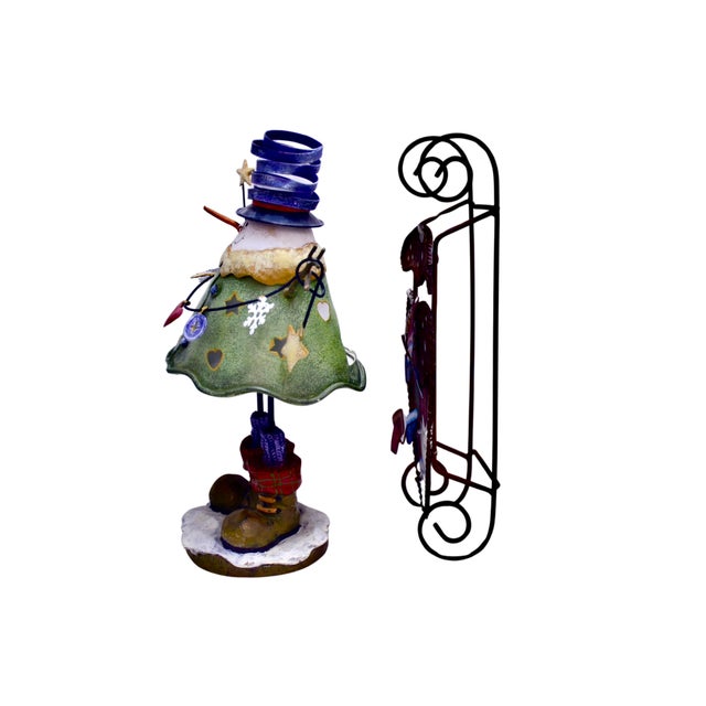 Whimsical 11 inch snowman candle holder and 11 inch sled metal wire sculptures with red, green, white, blue and ecru...