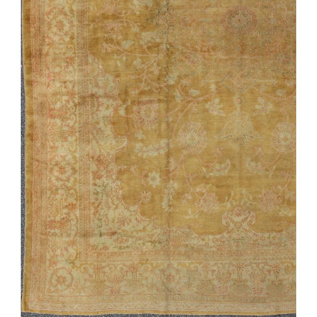 Stunning antique fine Burlu Oushak rug in gold, salmon, pink, soft green and neutral tones. Keivan Woven Arts / rug...