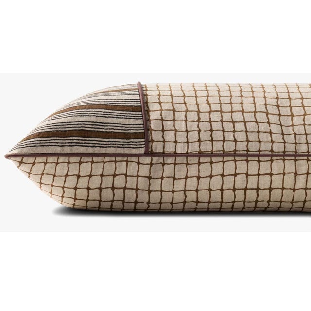 Two pattern lumbar pillow in brown color. Includes down filled insert. Material 100% linen. Specifications: Closure:...