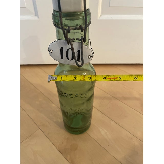 French Antique l'Ideale Bottle With Porcelain Top For Sale - Image 9 of 12