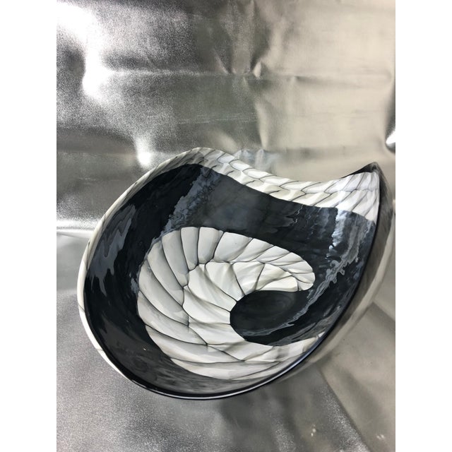 Gorgeous piece of art glass from Italy. It is not marked but in the style of Murano art glass. Great organic seashell...