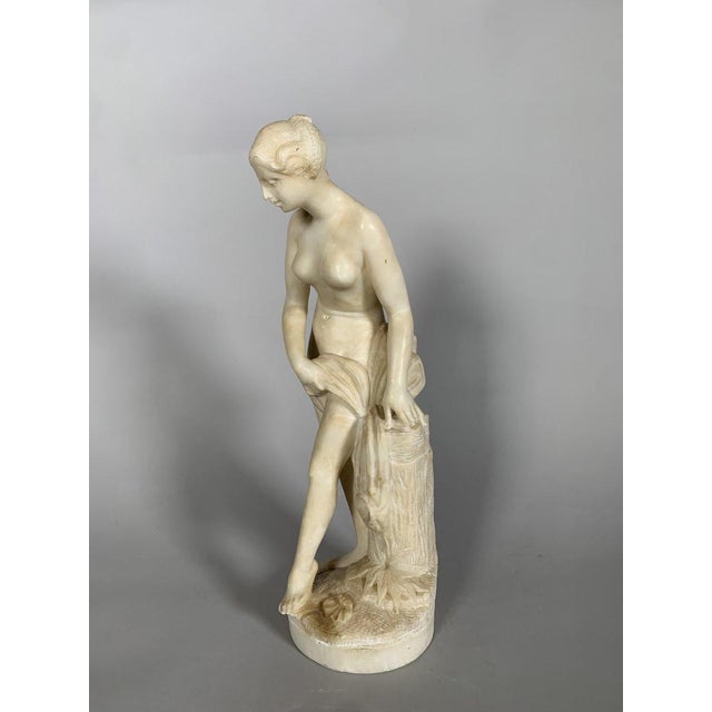 Alabaster sculpture of Diana at her bath, after Falconet (1716-1791). French work, mid-19th century, in the style of the...