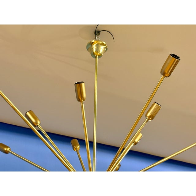 Sputnik Chandelier with 10 Lights – Brass and Matte Black Cones, Italy, 1960s : Refined Sputnik chandelier from the 1970s,...