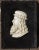 Carved profile bust of Leonardo Da Vinci. Mounted on velvet covered wood plaque. 19th century.