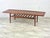Iconic Danish Teak Surfboard Coffee Table By Grete Jalk For Glostrup Møbelfabrik. Features A High Lipped Profile Along The...