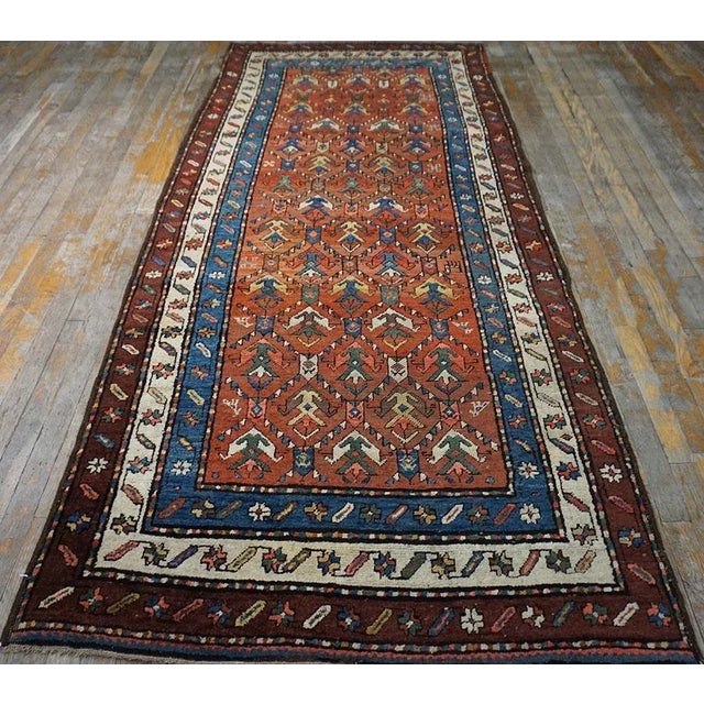 Antique Caucasian Rug, Size: 4' 0'' x9' 0'' Antique Hallway Runner Wool Coral Rug, Circa Date: 1900s. This exceptional...