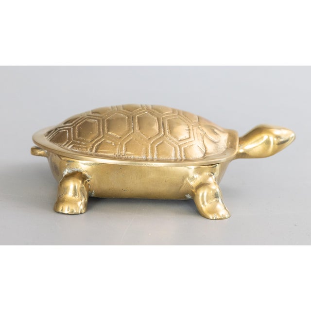 A beautiful vintage Art Deco style brass turtle vanity or dresser trinket box with hinged lid. This charming box has a...
