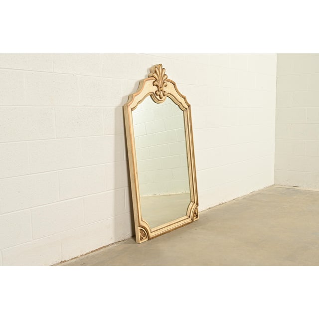 A gorgeous Hollywood Regency or French Rococo Louis XV style wall mirror By Romweber USA, Circa 1960s Carved cream...
