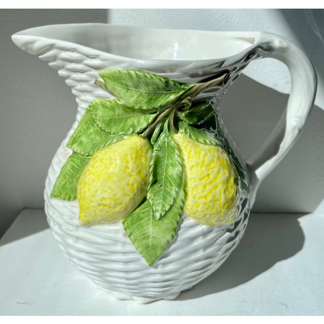 This charming vintage ceramic basketweave pattern pitcher features a lemons and leaves relief design. Made in Italy for...