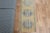 Vintage Hand-Knotted runner rug is a semi-antique vintage area rug. The '70s Eastern region of Anatolia's unique rug is...