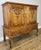 An impressive Vintage French Louis cabinet , beautifully crafted with intricate carvings and elegant proportions that...
