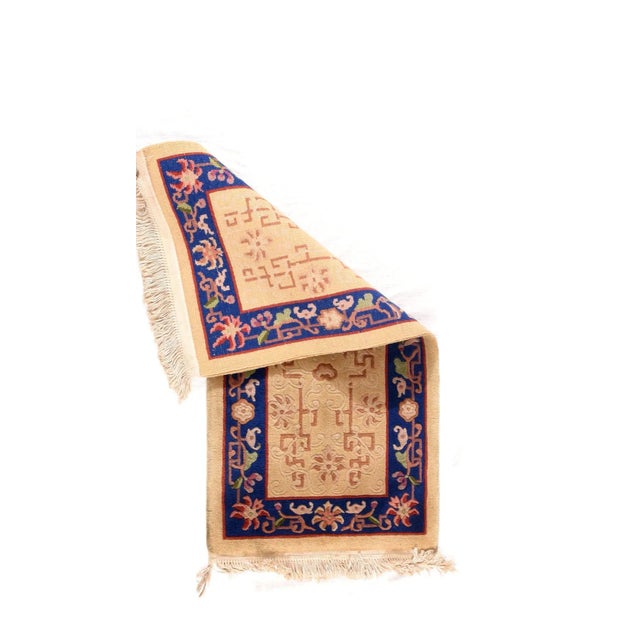 The straw beige field shows a red Shou (Good Luck) round medallion embedded in an end-to-end fret work accented with...