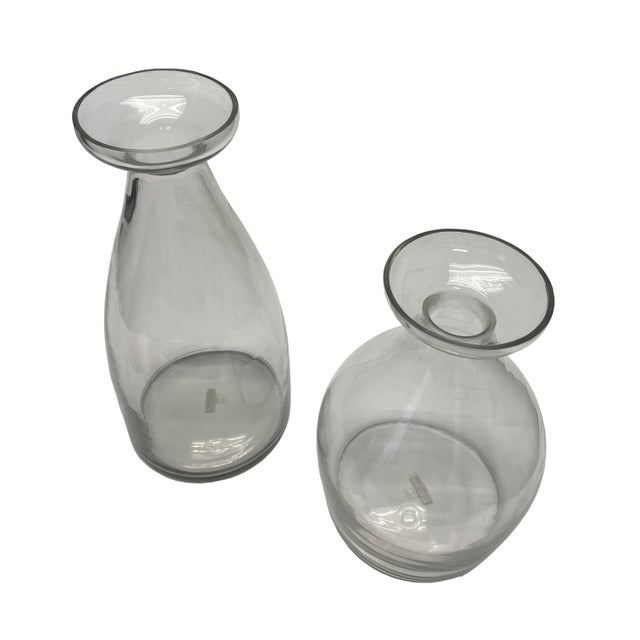 Arteriors Thayer Decanters are organic shaped glass containers with a marble sphere stopper. Tall: 5-1/2" diameter x...