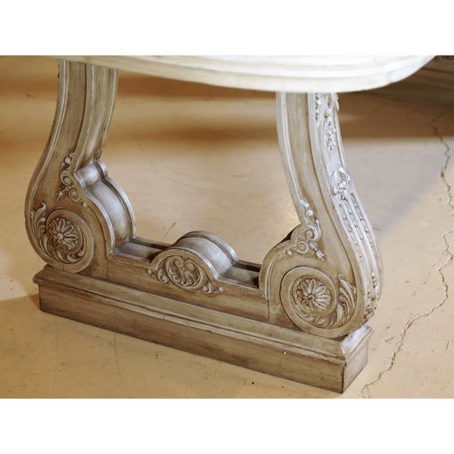 A highly decorative Maison Jansen dining table, circa 1940, showcasing the Parisian firm’s celebrated blend of classical...