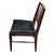 Handsome vintage wood side chair featuring a warm, dark-stained frame and a sleek black upholstered seat. The chair has a...