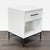 The Wood Tiled Nightstand by West Elm features hand-inlaid whitewashed tiles, a lacquered body, and antique bronze...