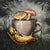 This oil on canvas work features a whimsical arrangement of mushrooms emerging from a coffee cup, set against a moody,...