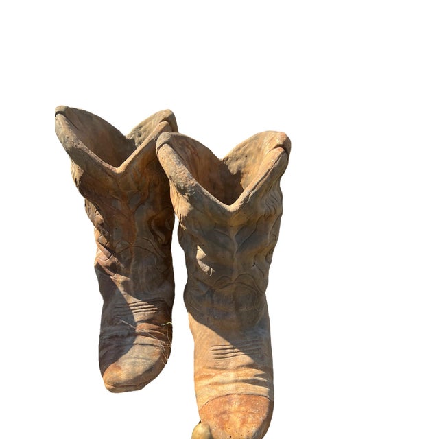 Up for consideration is a beautiful pair of concrete cowboy boot planters. These would be lovely in your home and they are...